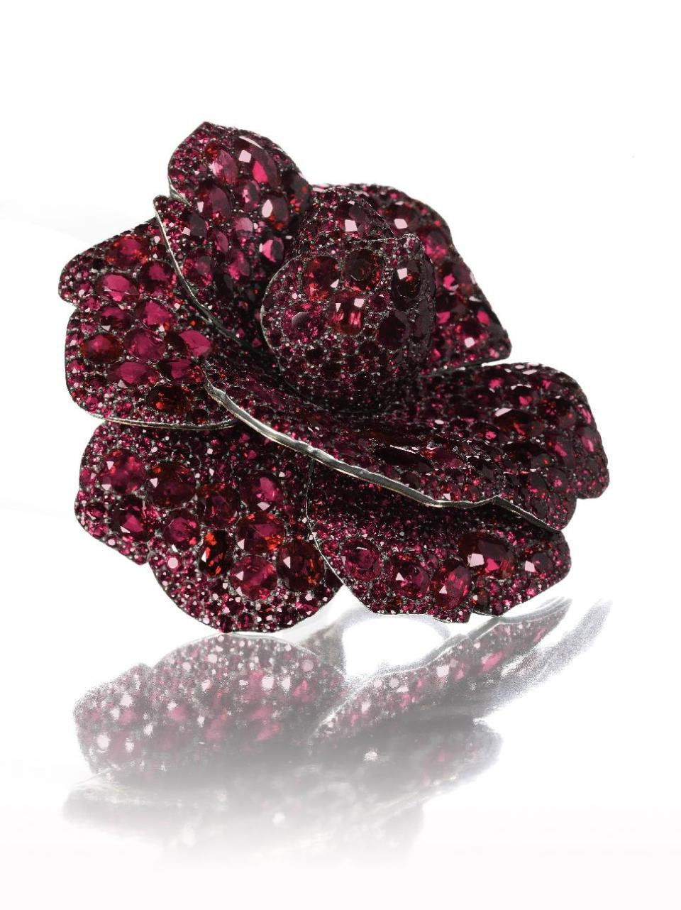 A ruby and diamond Camellia flower brooch, by JAR Created for Mrs Lily Safra in 2003