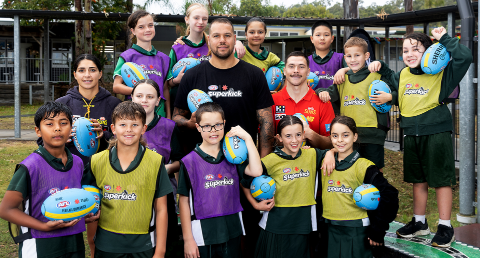 AFL great Buddy Franklin is seen here with school kids as part of his role with Superkick. 