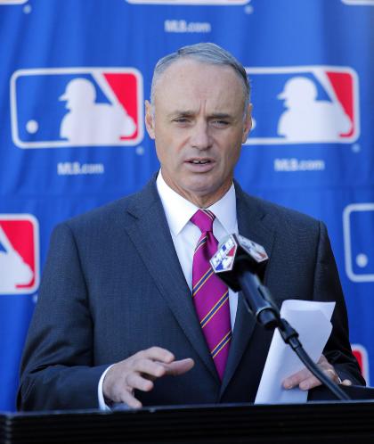 Rob Manfred has been full-time at Major League Baseball since 1998. (AP)