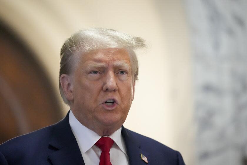 Former President Donald Trump speaks to the media before entering the courtroom at New York Supreme Court, Tuesday, Oct. 3, 2023, in New York. (AP Photo/Seth Wenig)