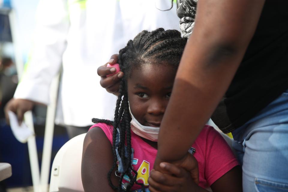 Scenes from a  COVID-19 vaccination clinic outside of Lee HealthÕs Golisano ChildrenÕs Hospital of Southwest Florida at HealthPark in Fort Myers on Saturday, Nov. 13, 2021. Several hundred children and families attended the event. The clinic was geared for children between the ages of 5-11 but anyone could receive a vaccine. People received the Pfizer vaccine.