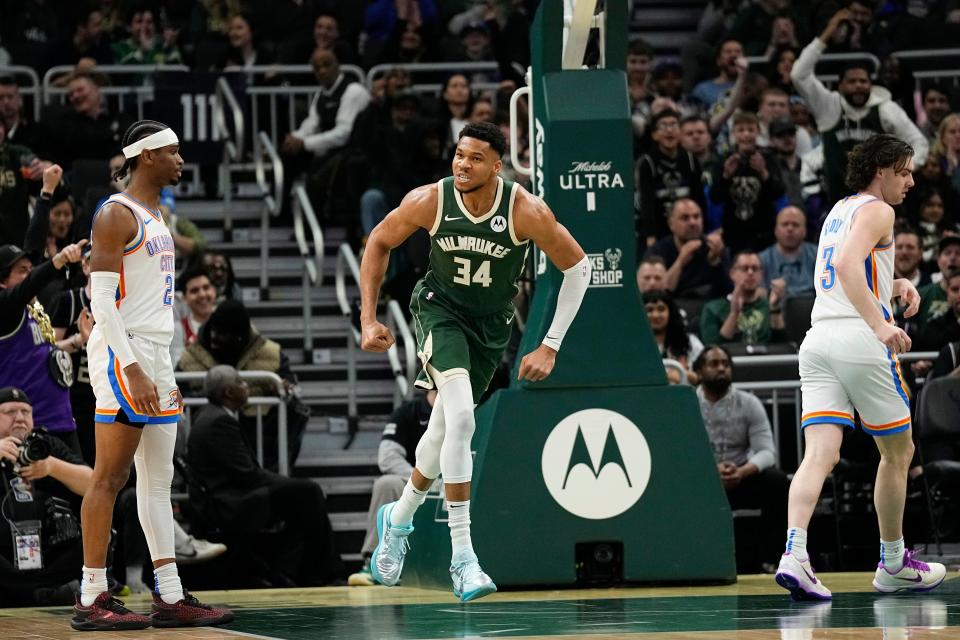 Bucks forward Giannis Antetokounmpo (34) reacts after scoring a basket during the first quarter against the Thunder at Fiserv Forum on Sunday night in Milwaukee.