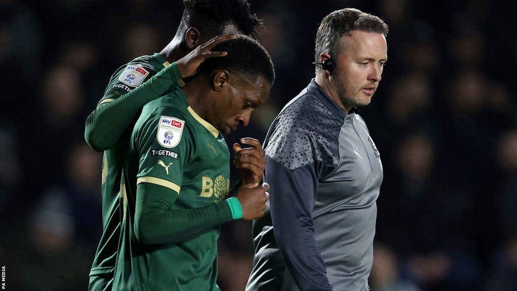 Mikel Miller limps off against Leicester City