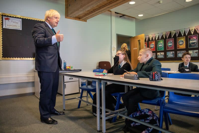 Britain's Prime Minister Boris Johnson visits Castle Rock school on the pupil's first day back to school, in Coalville