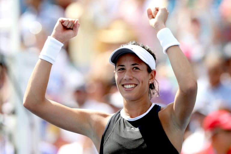 Garbine Muguruza of Spain celebrates her win at the WTA Cincinnati Open