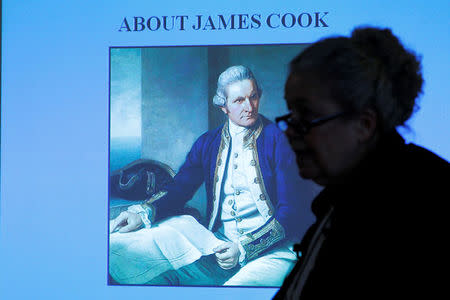 Dr. Kathy Abbass, executive director of the Rhode Island Marine Archeology Project, speaks in Providence, Rhode Island in front of a portrait of Captain James Cook as she announces that her organization believes it has found the wreck of Cook's ship the Endeavour, May 4, 2016. REUTERS/Brian Snyder
