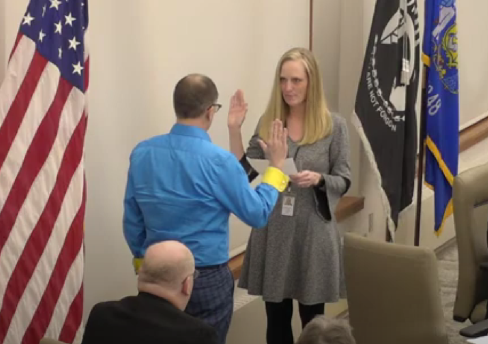 Daniel Peterson is sworn in as the new District 3 alderperson by Meredith DeBruin, city clerk. He will finish pervious alderperson Amanda Salazar's term, expiring April 2025.