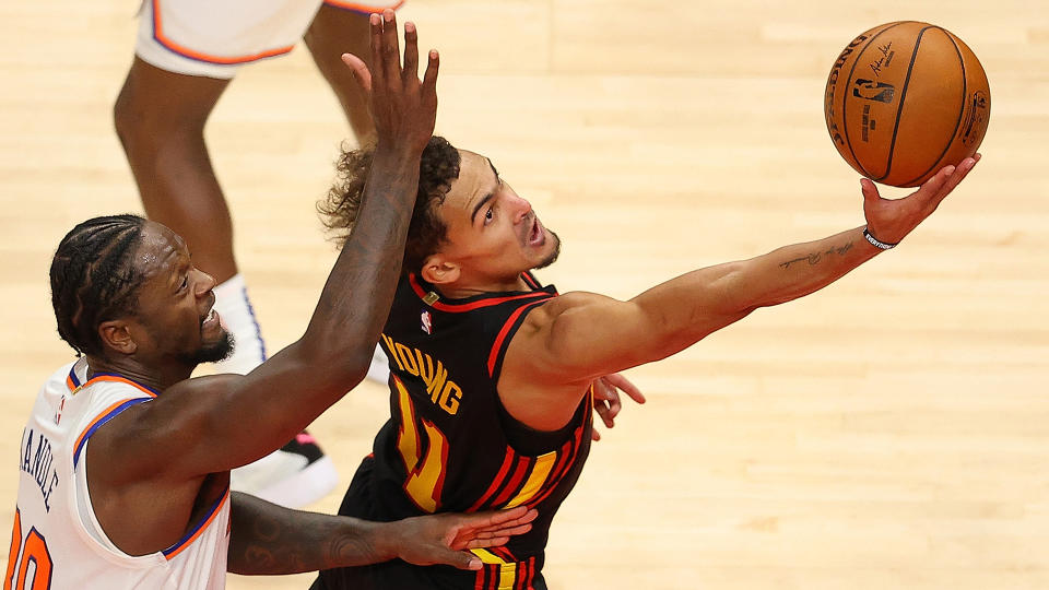 Trae Young and Julius Randle will be in the spotlight in their NBA playoff debuts. (Photo by Kevin C. Cox/Getty Images)