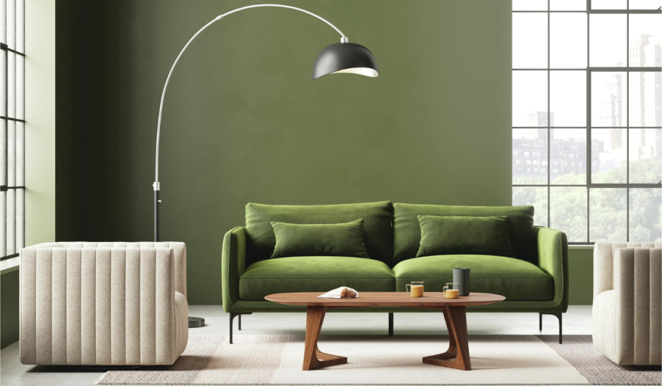 Green sofa in living room at Wayfair Way Day