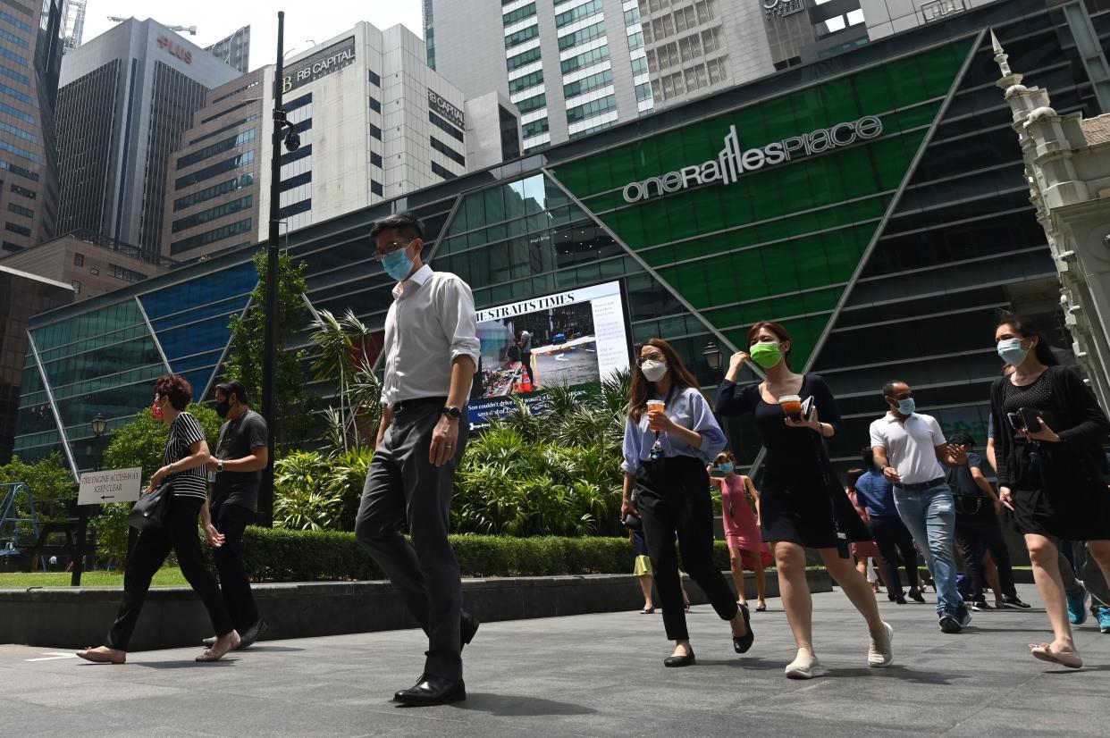 People seen in Singapore's central business district. (PHOTO: Getty Images)