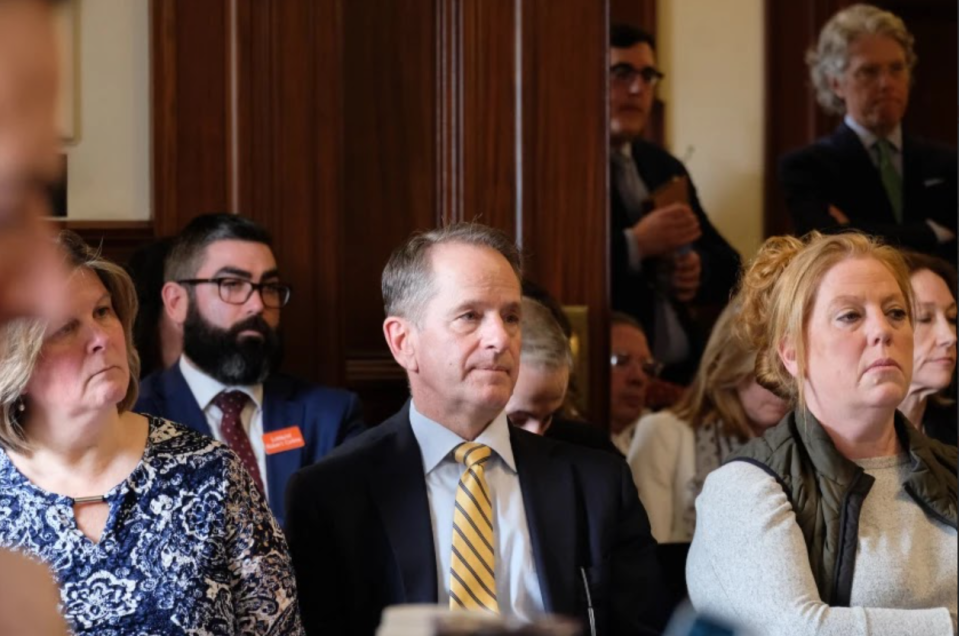 New Hampshire Education Commissioner Frank Edelblut, center, and Terese Bastarache, right, at the Governor and Executive Council meeting on March 27, 2024. Bastarache, who is running for a seat on the council, founded the activist group We The People NH and says she communicates with the commissioner regularly.