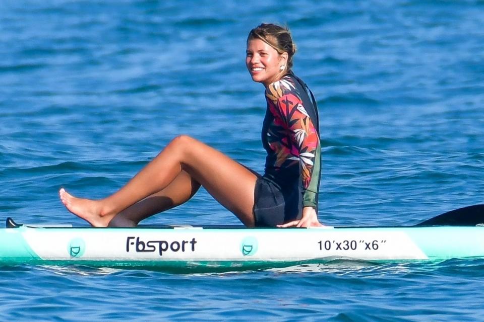 <p>Sofia Richie soaks up some sunshine on a paddle board in Malibu on Sunday. </p>