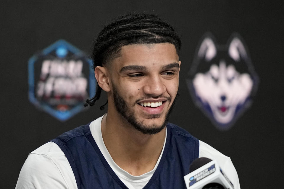 Connecticut guard Andre Jackson Jr. speaks during a news conference at the Final Four NCAA college basketball tournament on Sunday, April 2, 2023, in Houston. San Diego State and Connecticut play for the national championship on Monday. (AP Photo/David J. Phillip)