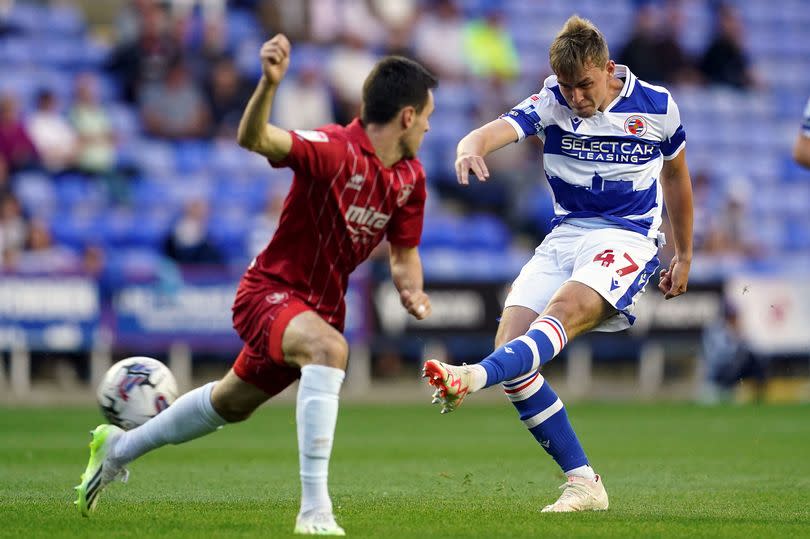 Matty Carson, right, in action for Reading during a League One match last season