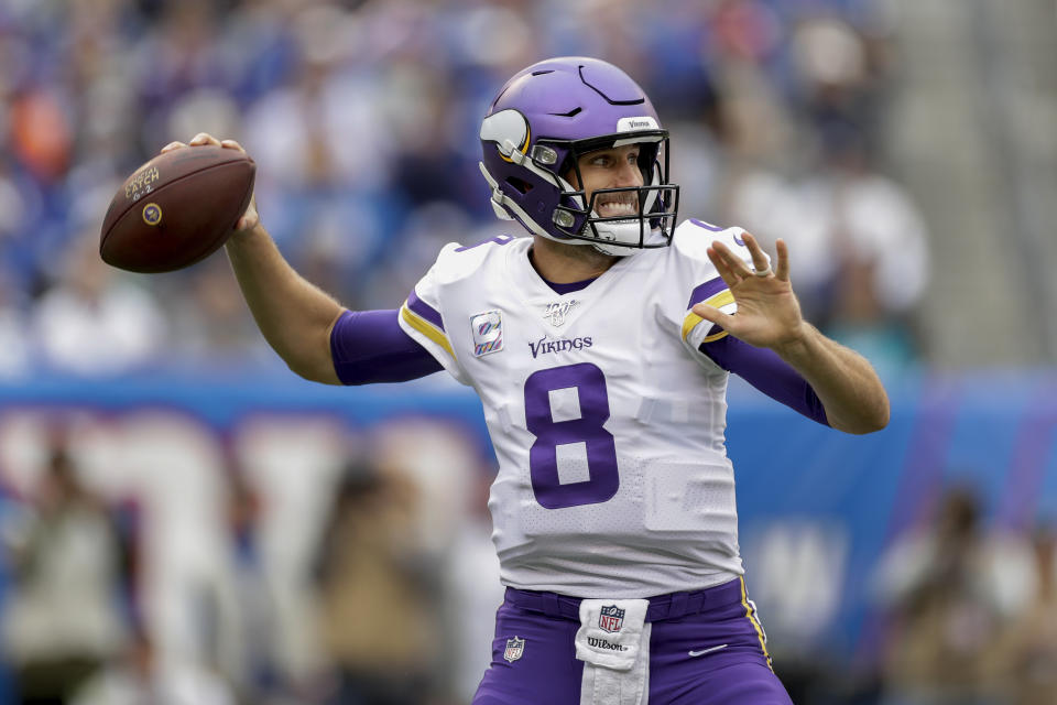 Minnesota Vikings quarterback Kirk Cousins (8) passes against the New York Giants during the first quarter of an NFL football game, Sunday, Oct. 6, 2019, in East Rutherford, N.J. (AP Photo/Adam Hunger)