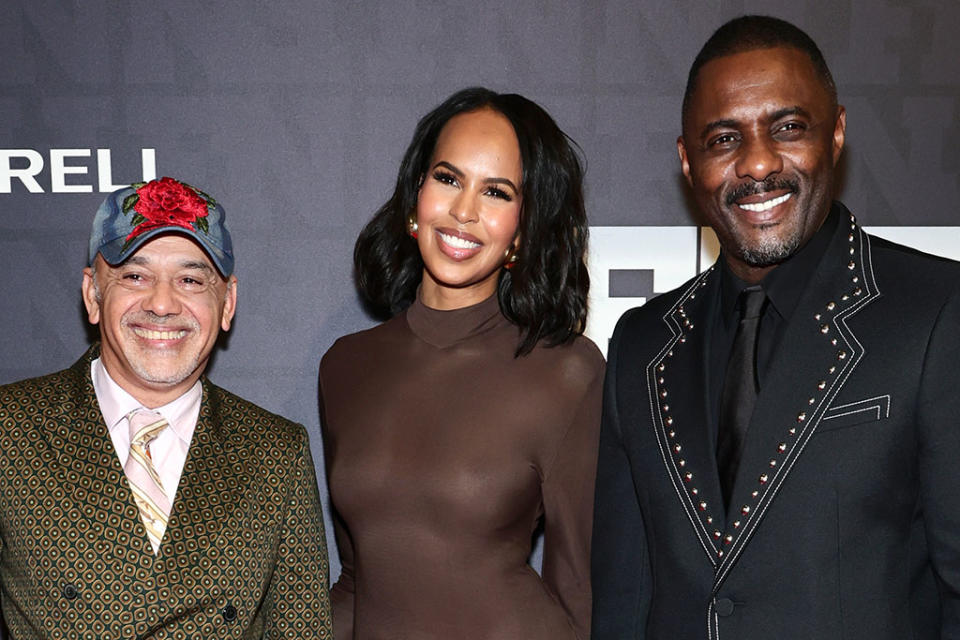 Christian Louboutin, Sabrina Dhowre Elba and Idris Elba attend the 2022 Footwear News Achievement Awards at Cipriani South Street on November 30, 2022 in New York. - Credit: Getty Images