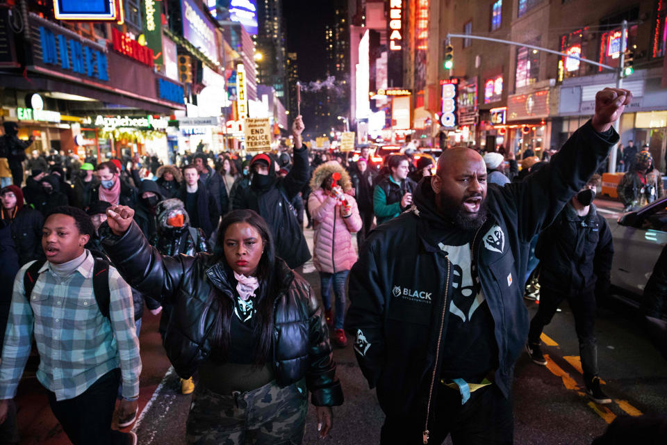 Demonstrators protest the fatal police assault of Tyre Nichols at Times Square in New York (Yuki Iwamura / AFP via Getty Images)