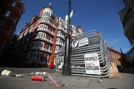 Metal barriers can be seen stacked up outside the Ecuadorian embassy, where Julian Assange remains inside, in central London, Britain, July 23, 2018. REUTERS/Hannah McKay