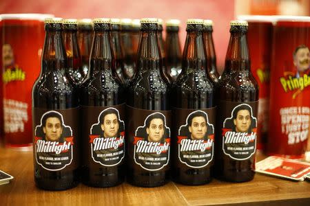 Bottles of beer mocking Britain's Labour Party leader Ed Miliband are displayed on a stall during the Conservative Party Conference in Birmingham, central England September 28, 2014. REUTERS/Darren Staples