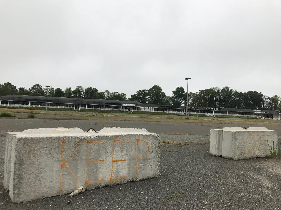 The former Peddler's Village shopping center along Atlantic Avenue in Wall is completely empty and blighted.