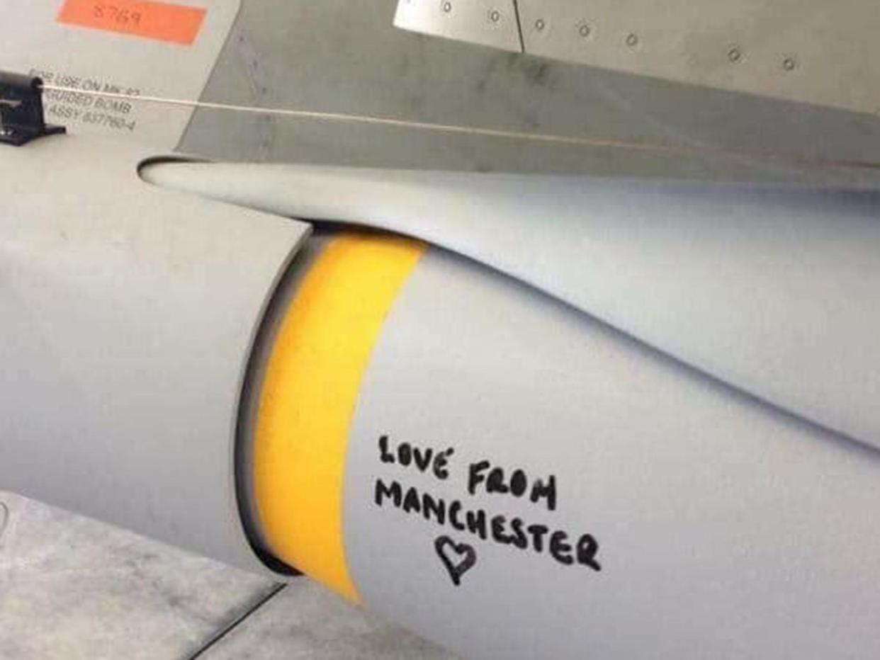 A message written on an RAF bomb reading 'Love from Manchester'