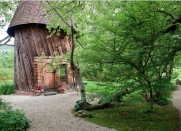 <body> <p>Formerly the summer home of famed sculptor Henry Hudson, this rustic retreat on the Santarella Estate in Massachusetts is an architectural masterpiece on its own. The two-story circular cottage, accented with a 35-foot conical roof, boasts a <a rel="nofollow noopener" href=" http://www.bobvila.com/slideshow/sweet-dreams-15-inventive-beds-you-can-make-yourself-45808#.WD-xZ6IrKRs?bv=yahoo" target="_blank" data-ylk="slk:luxurious canopy bed;elm:context_link;itc:0;sec:content-canvas" class="link ">luxurious canopy bed</a>, multi-paned windows, and a sitting room with spectacular views of the Berkshires.</p> <p><strong>Related: <a rel="nofollow noopener" href=" http://www.bobvila.com/slideshow/16-weirdly-awesome-summer-vacation-rentals-on-airbnb-50284?#.WD-oVaIrKRs?bv=yahoo" target="_blank" data-ylk="slk:16 Weirdly Awesome Summer Vacation Rentals on Airbnb;elm:context_link;itc:0;sec:content-canvas" class="link ">16 Weirdly Awesome Summer Vacation Rentals on Airbnb</a> </strong> </p> </body>