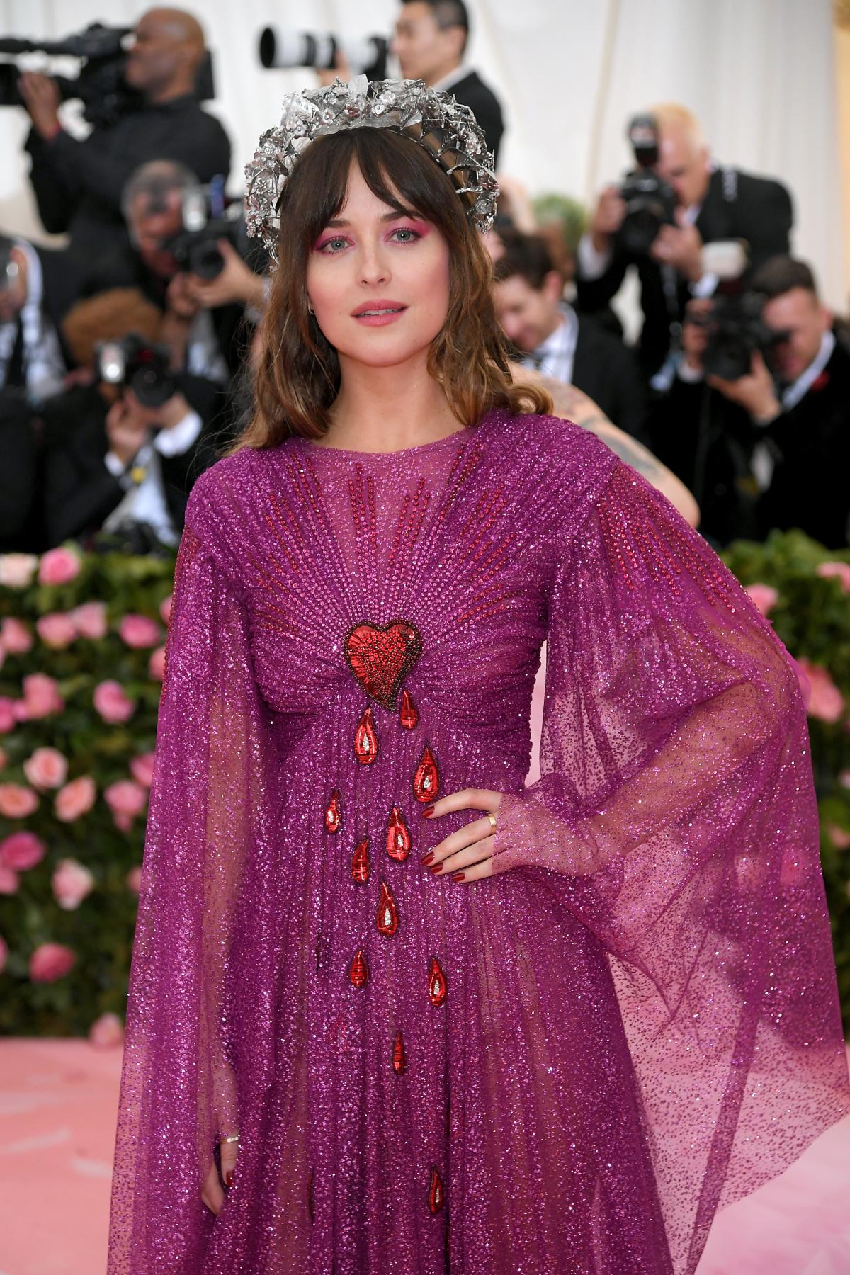 Here's Why Dakota Johnson Is Wearing a Bloody Heart Dress at the