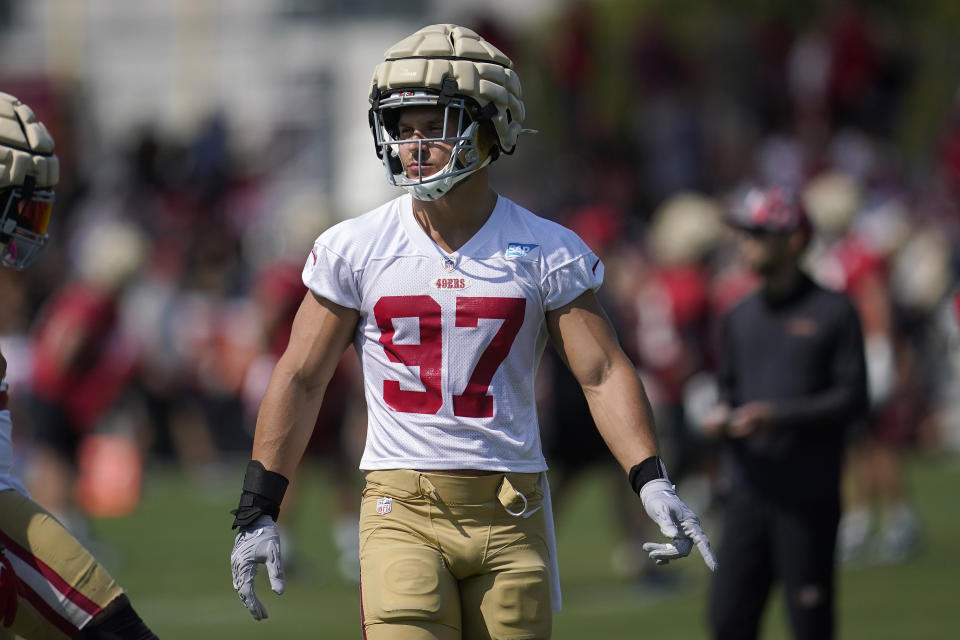 San Francisco 49ers defensive end Nick Bosa (97) takes part in drills at the NFL football team's practice facility in Santa Clara, Calif., Saturday, July 30, 2022. (AP Photo/Jeff Chiu)