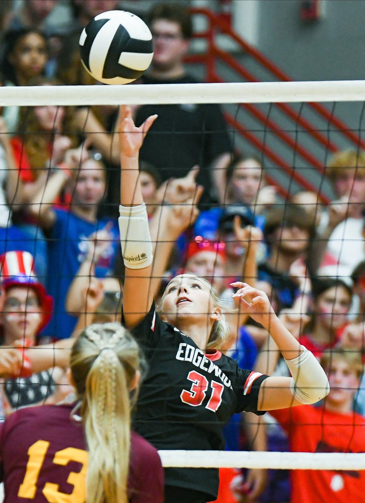 Edgewood’s Paige Roper (31) hits the ball during the volleyball match against Bloomington North at Edgewood on Thursday, Sept. 28, 2023.