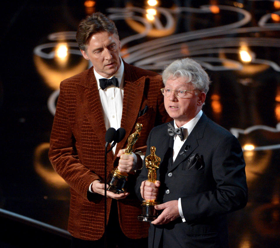 Nicholas Reed, left, and Malcolm Clarke accept the award for best short subject documentary of the year for “The Lady in Number 6: Music Saved My Life” on stage during the Oscars at the Dolby Theatre on Sunday, March 2, 2014, in Los Angeles. (Photo by John Shearer/Invision/AP)