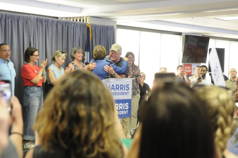 U.S. Sen. Amy Klobuchar hugs Minnesota Gov. Tim Walz during the state's Harris for President campaign kickoff.