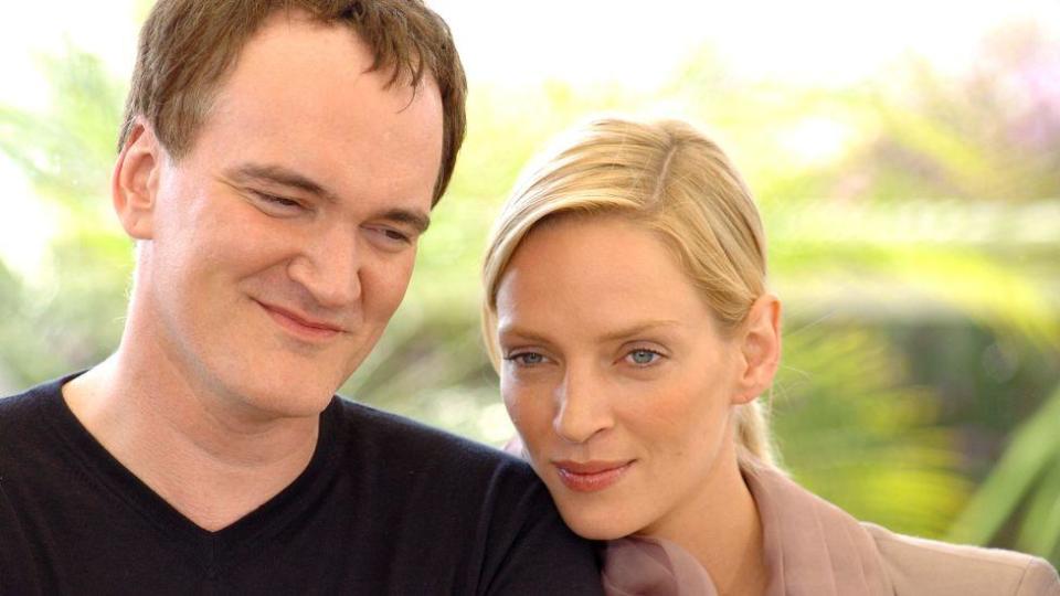 Quentin Tarantino and Uma Thurman during 2004 Cannes Film Festival - "Kill Bill Vol. 2" - Photocall at Palais Du Festival in Cannes, France