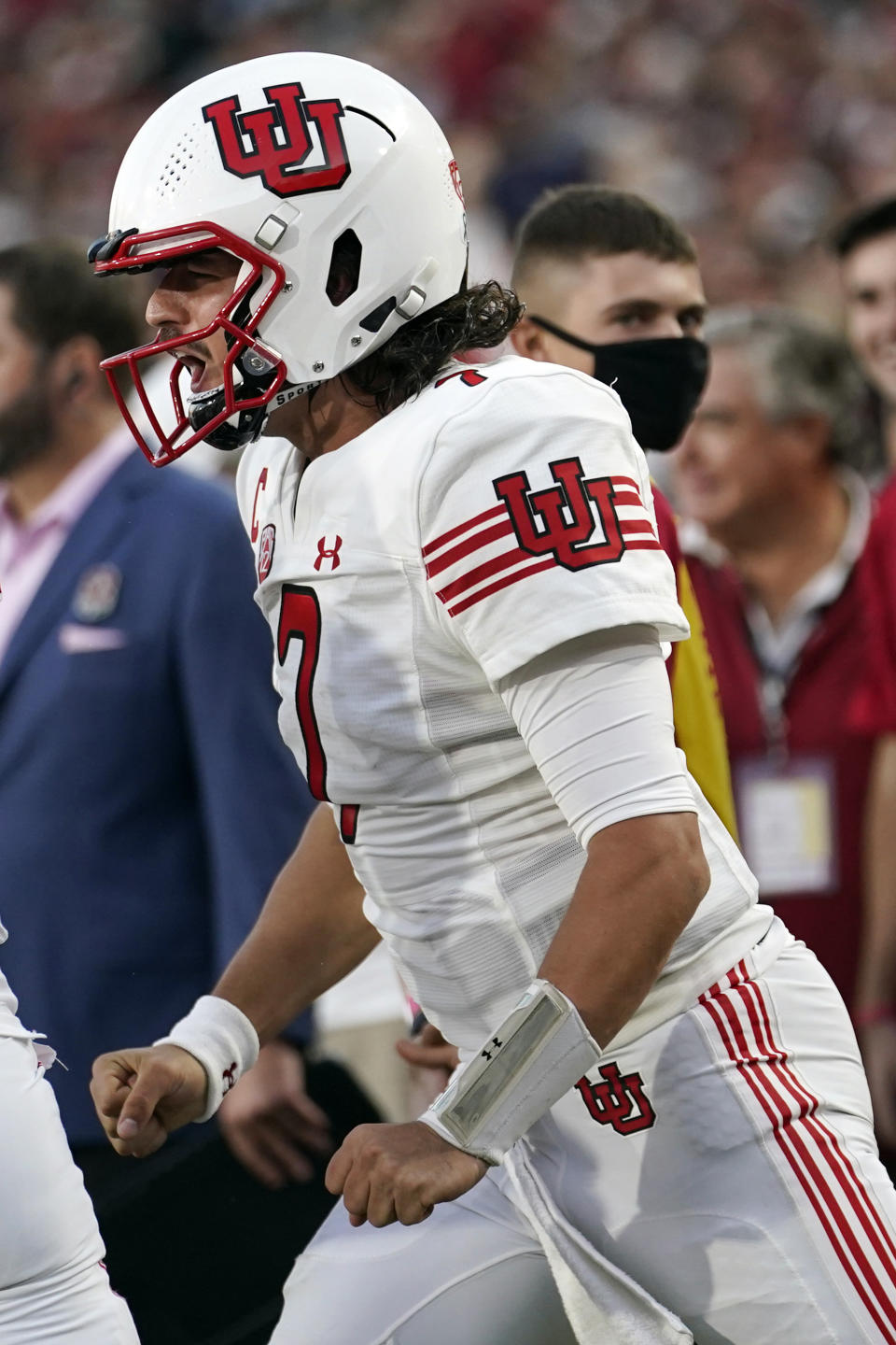 Utah quarterback Cameron Rising celebrates after throwing a touchdown pass to wide receiver Money Parks during the first half of an NCAA college football game against Southern California Saturday, Oct. 9, 2021, in Los Angeles. (AP Photo/Marcio Jose Sanchez)