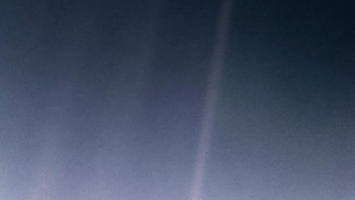 The iconic "Pale Blue Dot" image taken by Voyager 1 on February 14, 1990.