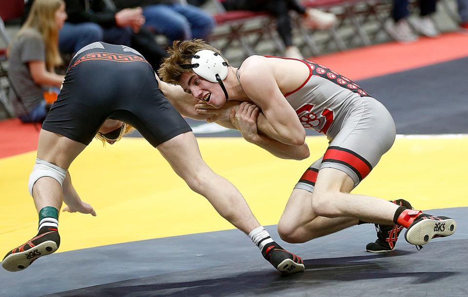 Crestview's Hayden Kuhn wrestles Pleasant's Daxton Chase during their 144 lbs. match at the OHSAA State Wrestling Championships Sunday, March 12, 2023 at the Jerome Schottenstein Center. . TOM E. PUSKAR/ASHLAND TIMES-GAZETTE