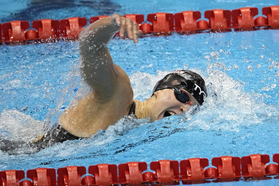 FILE - Katie Ledecky competes in the women's 800-meter freestroke final at the World Swimming Championships in Fukuoka, Japan, Saturday, July 29, 2023. Given the unusual timing — a lingering fallout from the COVID-19 pandemic — many of the biggest names have decided to skip the World Aquatics Championships meet in Doha, Qatar. (AP Photo/David J. Phillip, File)