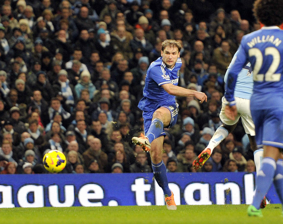 Chelsea's Branislav Ivanovic scores the first goal of the game for his side during their English Premier League soccer match against Manchester City at the Etihad stadium in Manchester, England, Monday Feb. 3, 2014. (AP Photo/Clint Hughes)