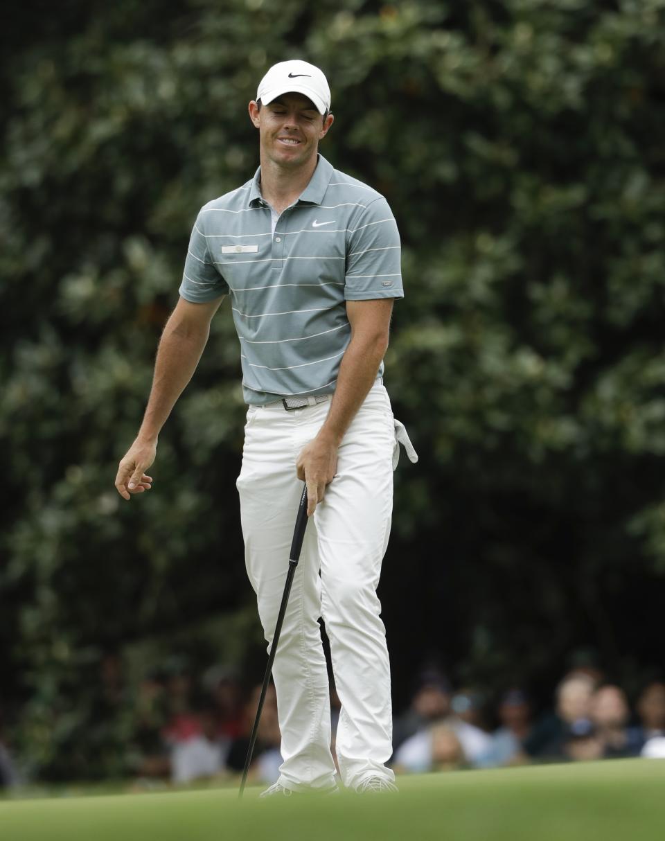 Rory McIlroy, of Northern Ireland, reacts after missing a putt on the first hole during the third round for the Masters golf tournament Saturday, April 13, 2019, in Augusta, Ga. (AP Photo/Marcio Jose Sanchez)