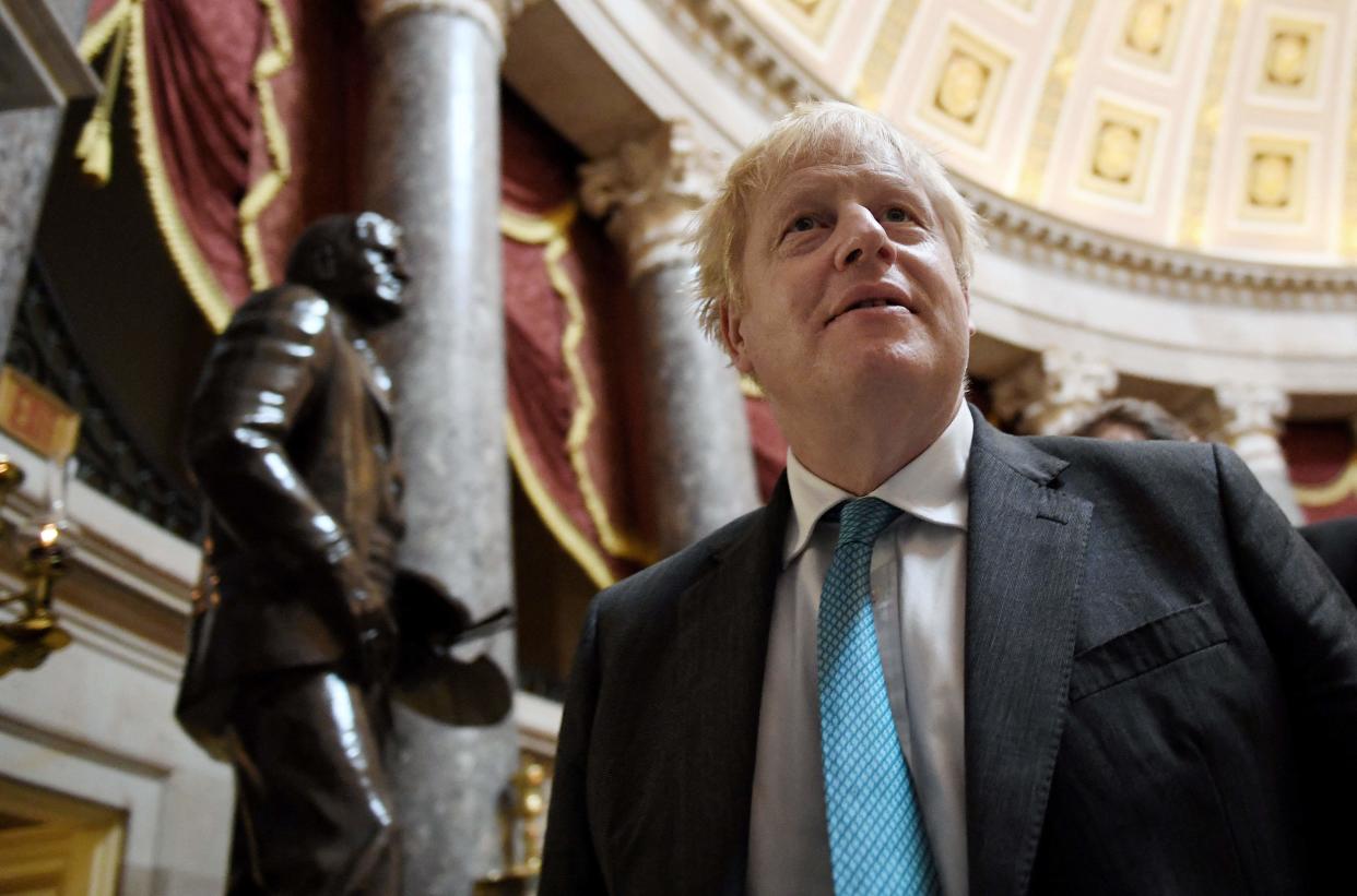 Boris Johnson issued his plea to Macron after visiting the US Capitol in Washington on Wednesday  (AFP via Getty Images)