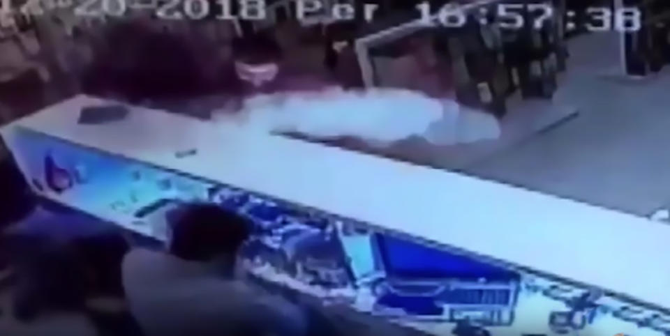 A smartphone with a swallowed battery explodes in the hands of a repairman in a mobile phone shop in eastern Turkey. Source: CEN/Australscope