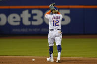 New York Mets shortstop Francisco Lindor (12) reacts after committing an error, allowing Chicago Cubs' Ian Happ to reach first during the eighth inning of a baseball game Thursday, June 17, 2021, in New York. The Cubs shut out the Mets, 2-0. (AP Photo/Kathy Willens)