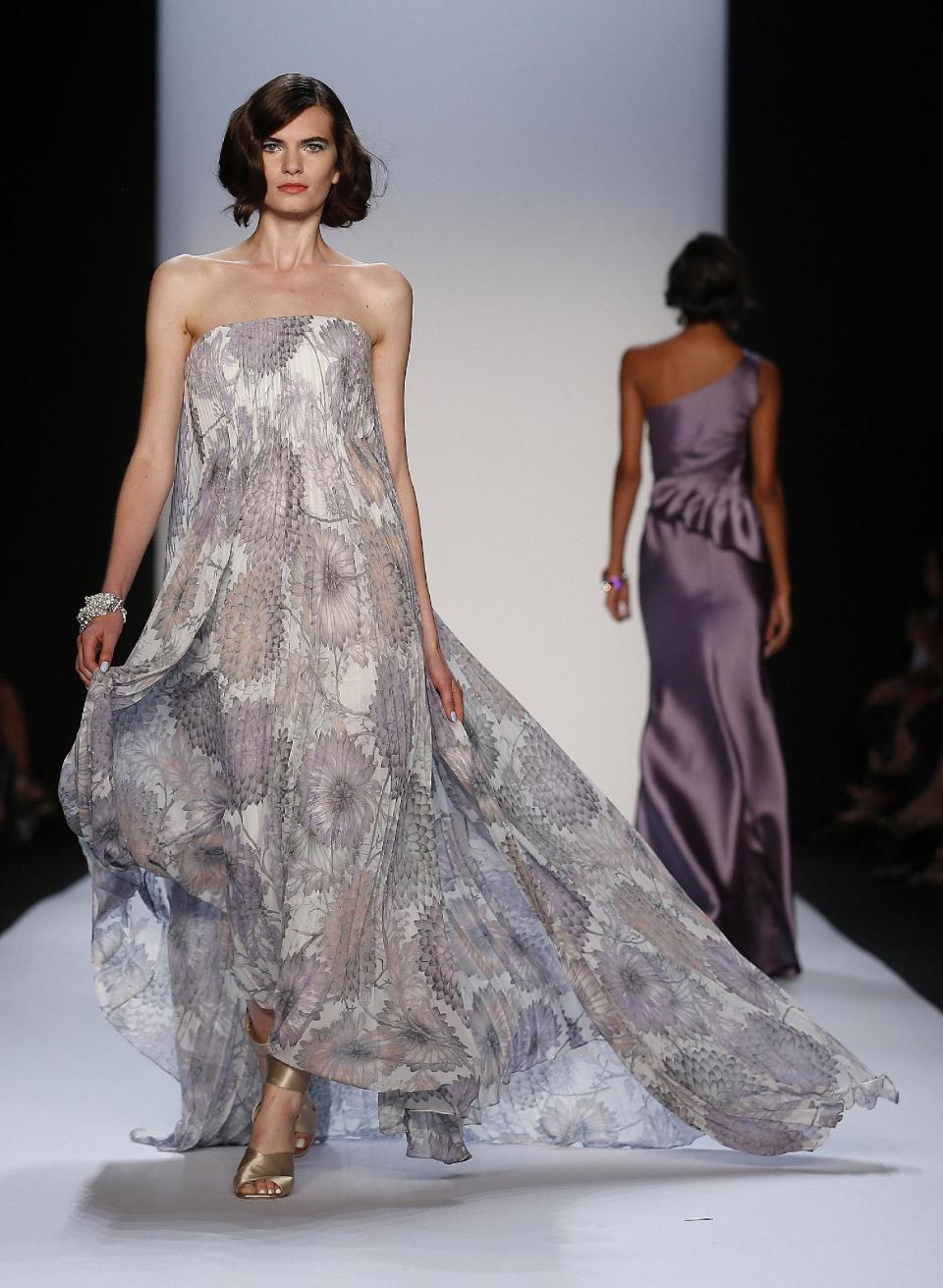 The Badgley Mischka Spring 2014 collection is modeled during Fashion Week in New York, Tuesday, Sept. 10, 2013. (AP Photo/John Minchillo)