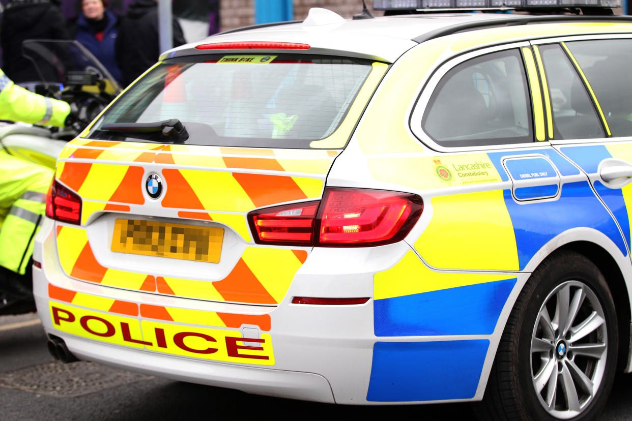 Police vehicles outside the ground before the game