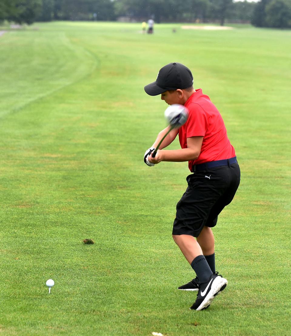 Issac Scott of Dundee tees off on Day 2 of the 44th annual La-Z-Boy Junior Open on Wednesday at Green Meadows.