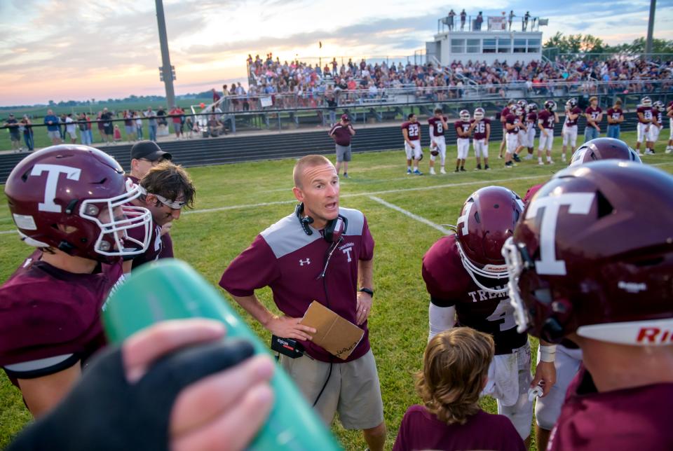 Tremont head football coach Zach Zehr addresses his team at the quarter break at the Turks battle Eureka on Friday, Sept. 2, 2022 in Tremont.