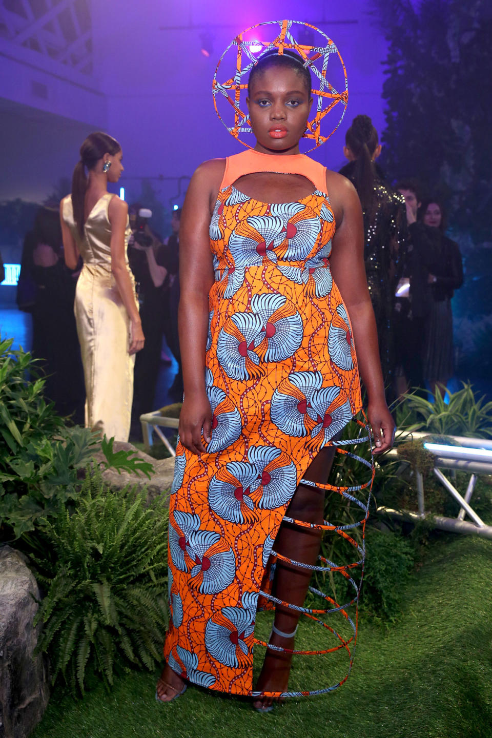 <p>Model wears a besoke dress design by Tolu Aremu and Becca McCharren of Chromat at the Black Panther Welcome to Wakanda NYFW fashion presentation. (Photo: Courtesy of Marvel Studios Black Panther/Getty) </p>