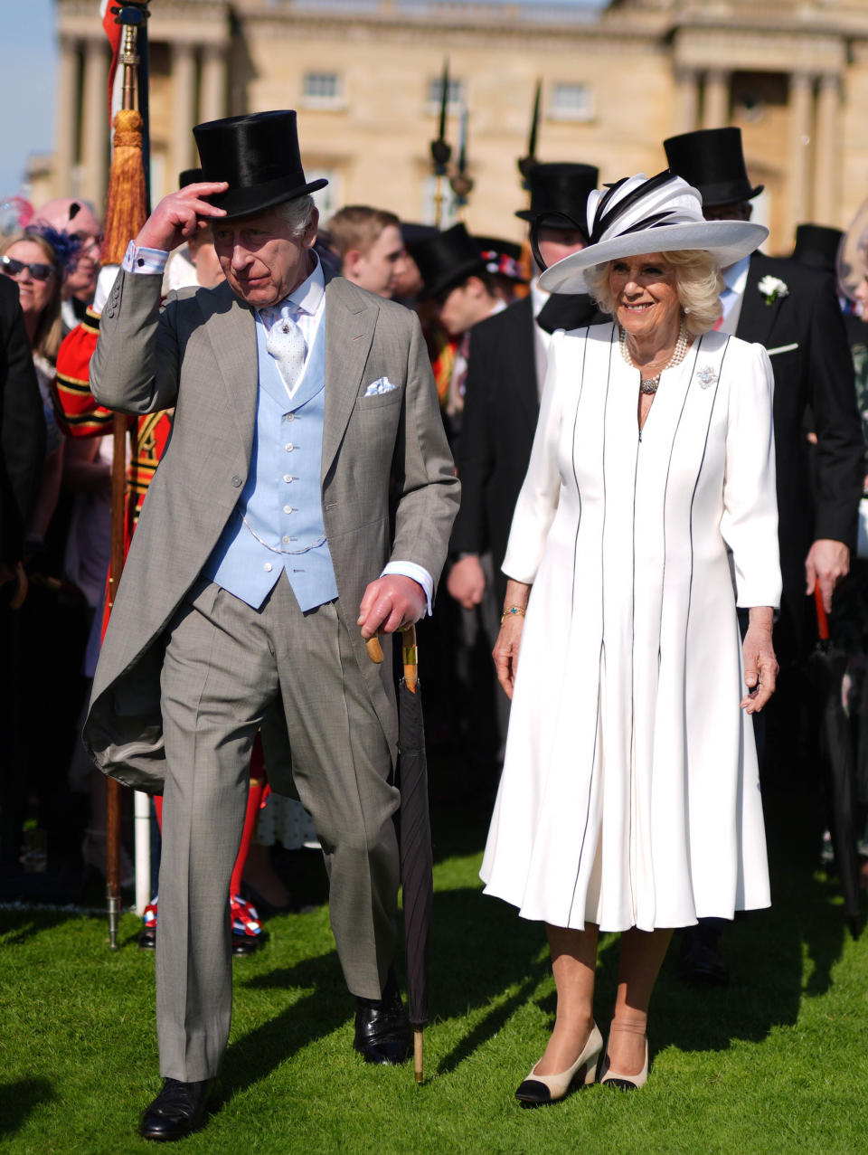 Queen Camilla in Chanel shoes.