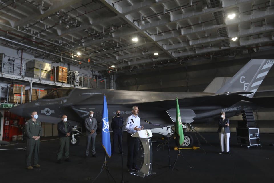 NATO Secretary General Jens Stoltenberg speaks during a media conference on board the aircraft carrier HMS Queen Elizabeth, as it participates in the NATO Steadfast Defender 2021 exercise, off the coast of Portugal, Thursday, May 27, 2021. NATO has helped provide security in Afghanistan for almost two decades but the government and armed forces in the conflict-torn country are strong enough to stand on their own feet without international troops to back them, the head of the military organization said Thursday. (AP Photo/Ana Brigida)