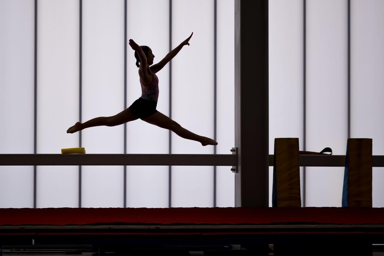 Bel Air girls gymnastics prepare for State at practice on Thursday, April 14, 2024. Bel Air will host state at their gym.