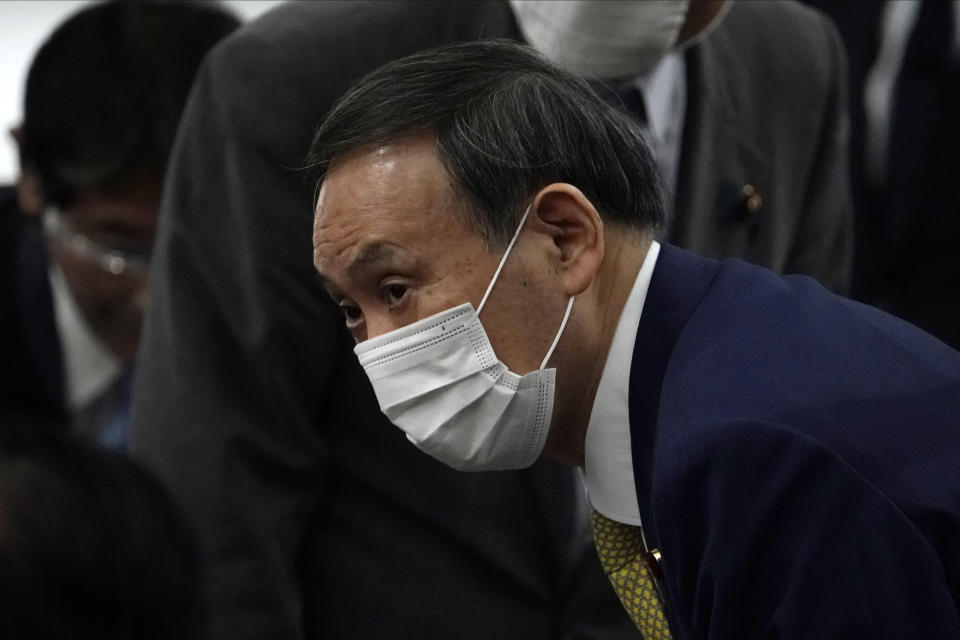 Japanese Chief Cabinet Secretary Yoshihide Suga attends the Liberal Democratic Party's (LDP) leadership election Monday, Sept. 14, 2020, in Tokyo. The ruling LDP chooses its new leader in an internal vote to pick a successor to Prime Minister Shinzo Abe, who announced his intention to resign last month due to illness. (AP Photo/Eugene Hoshiko, Pool)